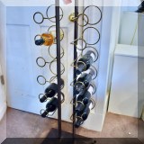 D20. Metal wine rack.  